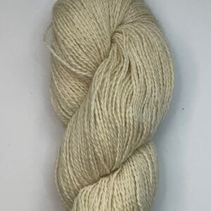 Cream 100% Shetland fingering yarn skein, close view of the twist