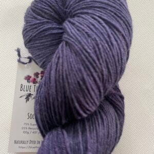 October Dusk sock weight naturally dyed yarn, dark violet skein