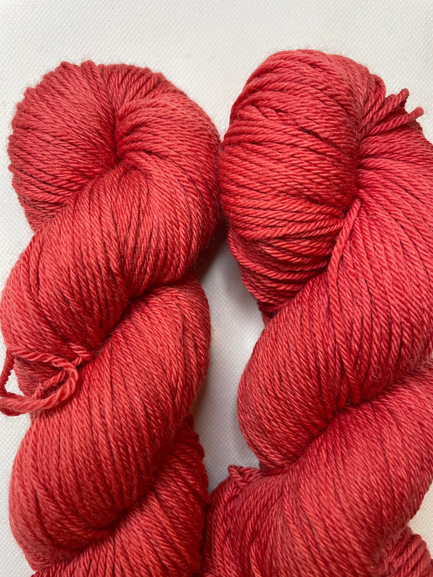 Maple Red hand-dyed yarn skein, middle crimson